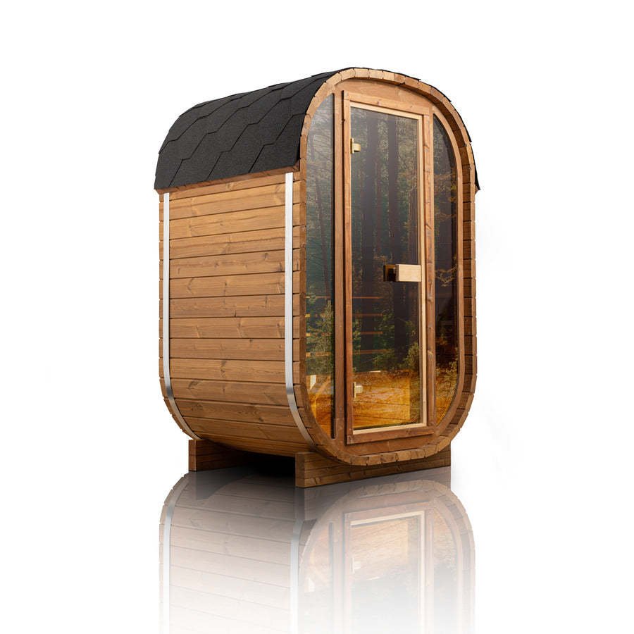 Auris One outdoor cedar sauna, rounded cabin with a glass door and dark shingled roof, shown from the front left