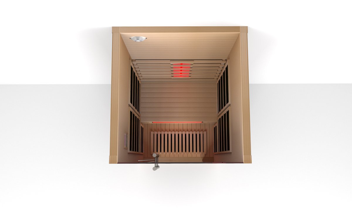 Overhead view into the Lumin One cabin showing the bench, backrest emitter and floor heater