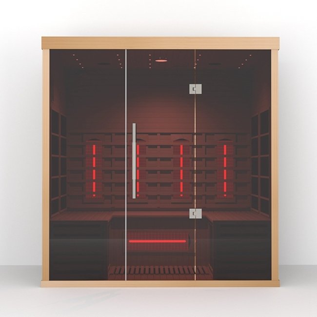 Lumin Three infrared sauna, a wide hemlock cabin with tinted double glass doors and glowing infrared emitters inside